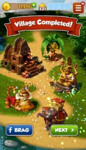 Coin Master Village Completed screen showing completed village, decorative buildings, tiger pet, and elephant companion.
